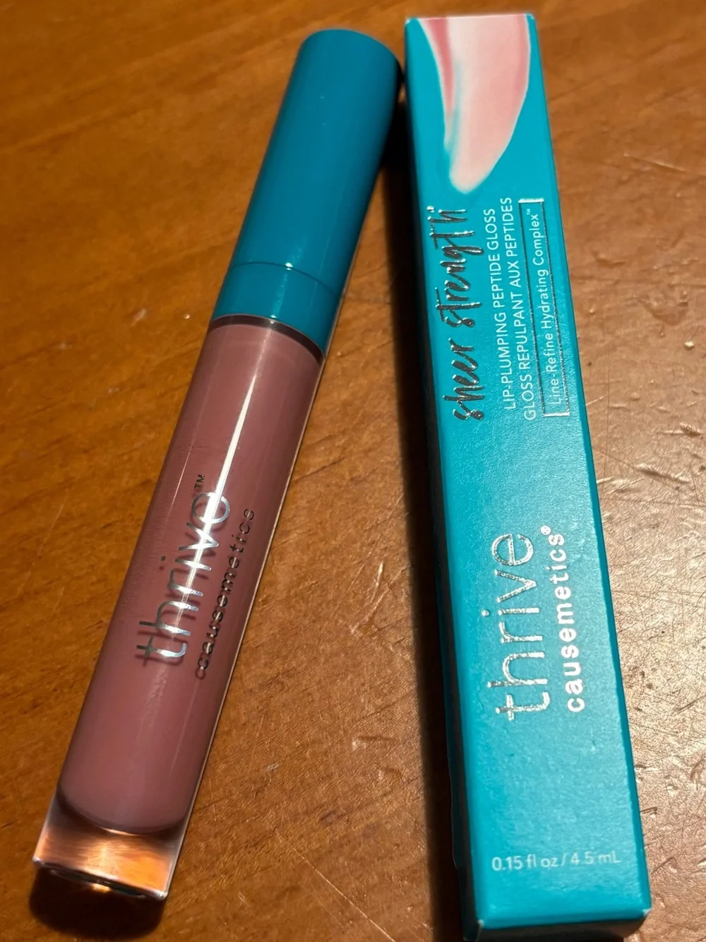 Thrive causemetics Sheer Strength Lip Plumping Lipgloss
